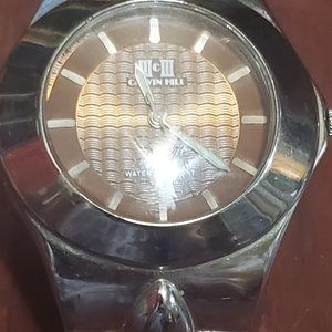 unisex mcm/calvin hill watch with brown dial
